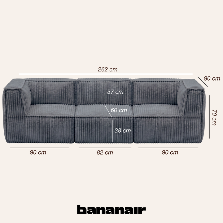 Canapé modulable 3 places déhoussable en velours côtelé gris foncé avec dimensions 90 x 262 cm indiquées