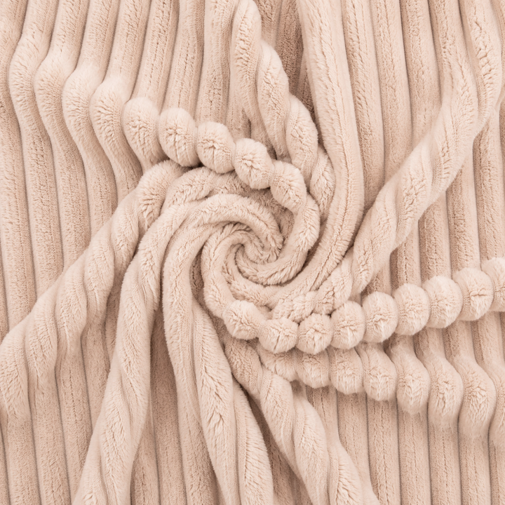 Housse de pouf poire fourrure côtelée, gros plan sur la texture du tissu côtelé