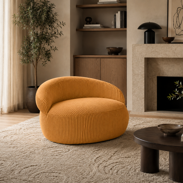 Pouf XXL déhoussable en velours côtelé jaune, assise et dossier arrondis, dans un salon.
