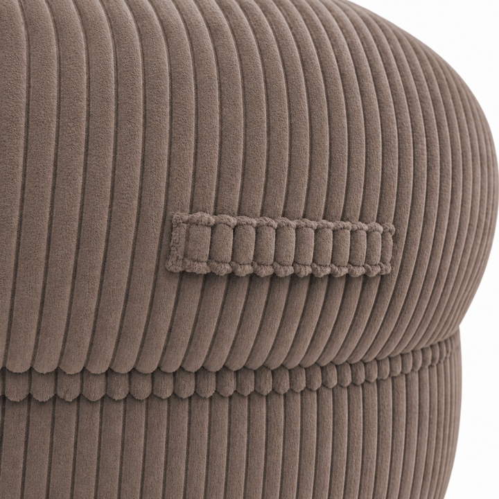 Gros plan sur la poignée du pouf XXL, tissu en velours côtelé.