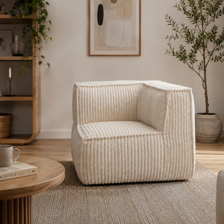 Module d’angle droit en velours côtelé blanc cassé, dans un salon