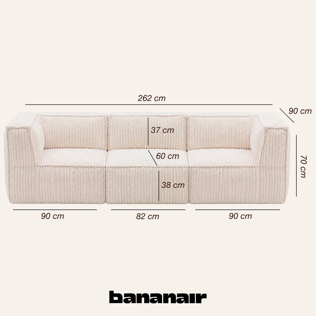 Canapé modulable 3 places déhoussable en velours côtelé blanc cassé avec dimensions 262×90 cm