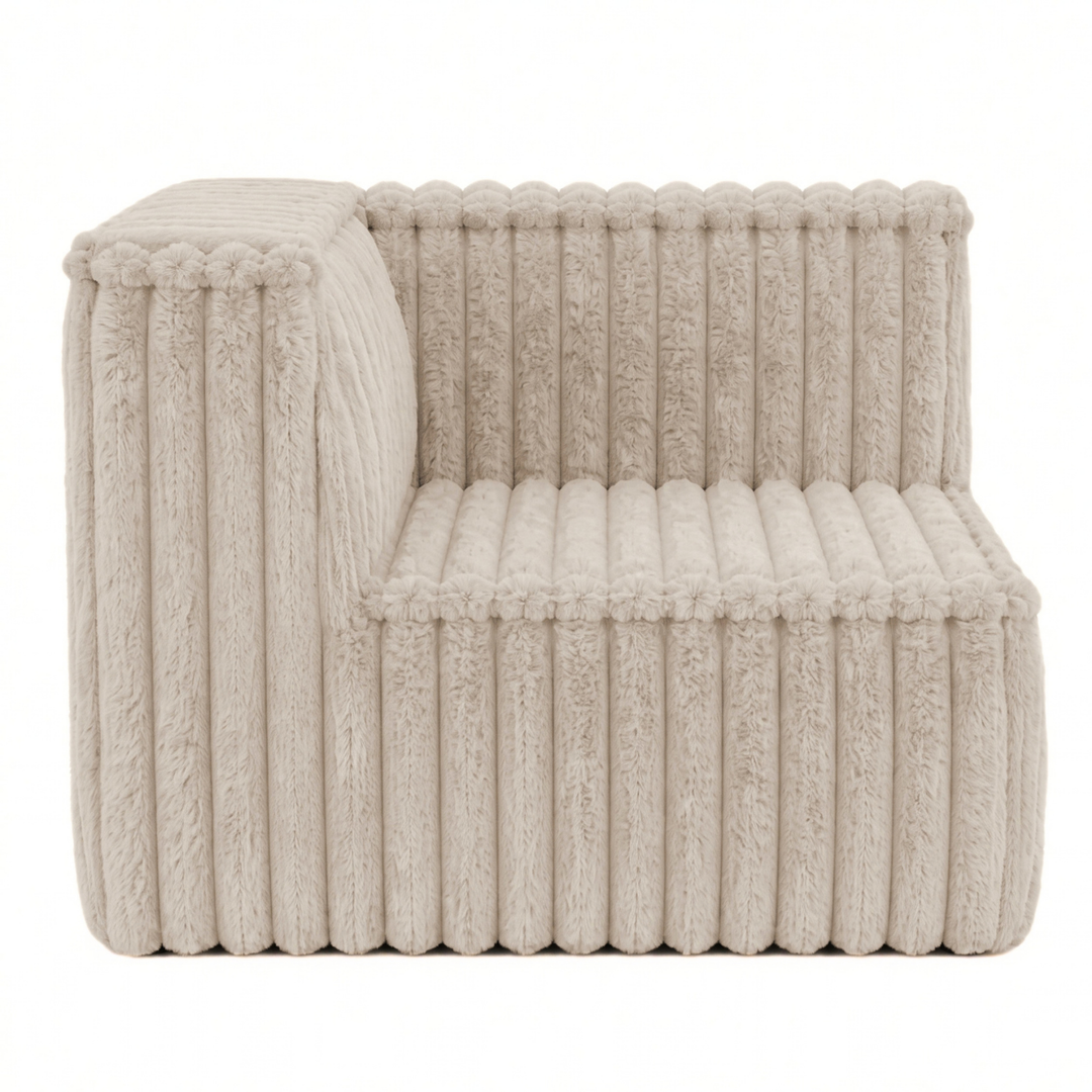Module d’angle gauche pour canapé modulable déhoussable en fourrure côtelée beige, forme compacte.